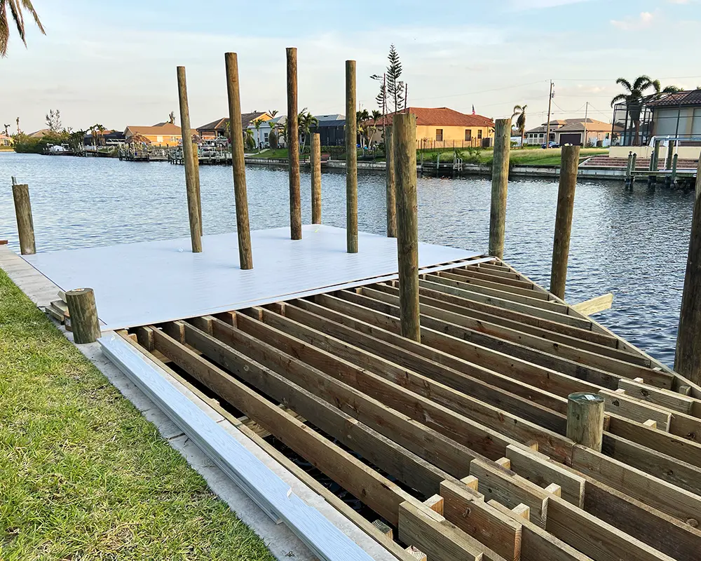 In-progress photo of an installation to repair or replace your dock, as performed by Overall Outdoor Services in Naples, Florida.