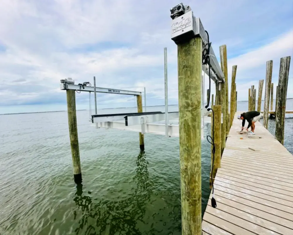 How to Protect Your Dock During Hurricane Season. Featuring a photo of a man on his Florida dock.
