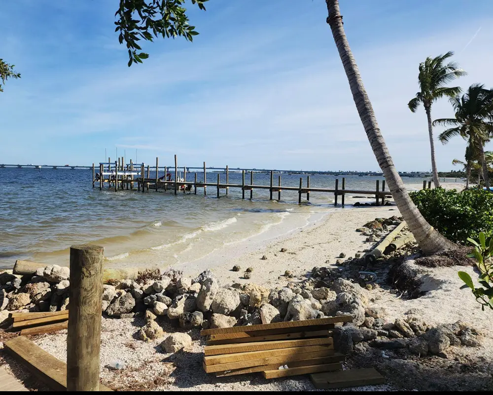 Dock Types: Which One Is Right for Your Lifestyle? Featuring a photo of a dock under construction by Overall Marine Services.